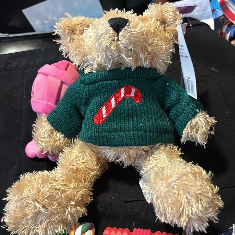 New 5 dog toys. For medium dog 3 rope 1 ready bear and 1 Hertz dura play toy